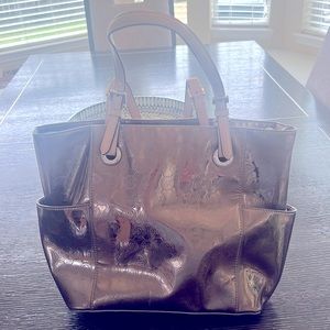 Michael Kors metallic silver shoulder bag.